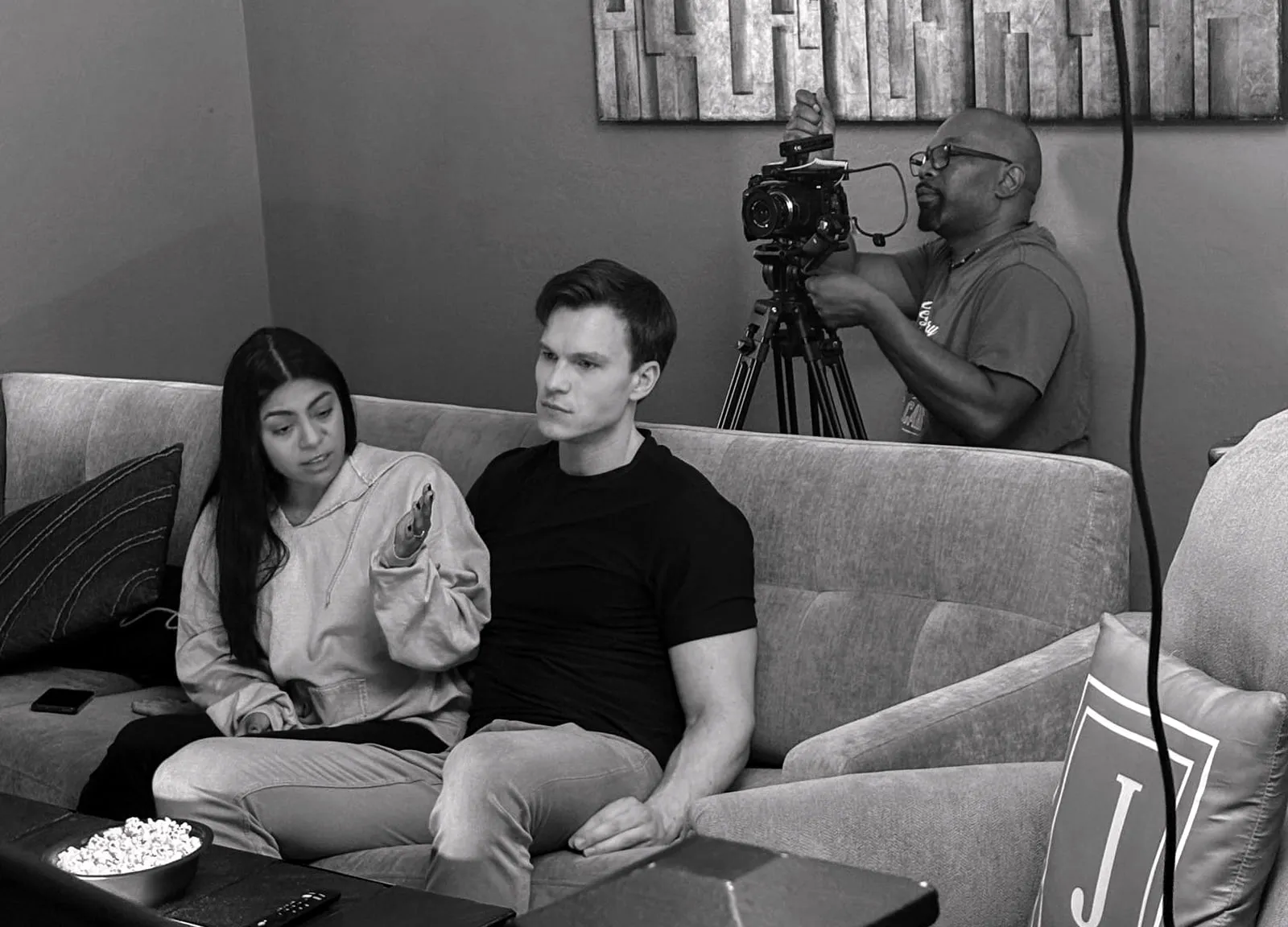 Or Death, behind the scenes — waiting on the sofa while the camera resets
